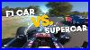 F1-Car-Vs-Supercar-At-Mount-Panorama-Circuit-In-Bathurst-01-gx
