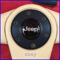 Genuine Jeep Cherokee XJ original Momo leather steering wheel. RARE! NOS! 14A