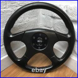 Genuine Momo Ghibli 4 spoke 360mm black leather steering wheel. Dated 1997. 7D