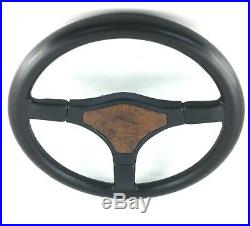 Genuine Momo Jaguar 380mm black leather steering wheel with wood centre pad. 7E