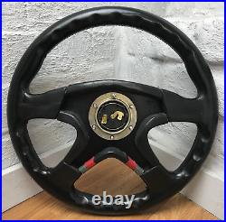 Genuine Momo M36 Ghibli 360mm black leather 4 spoke steering wheel, 1990. 7C